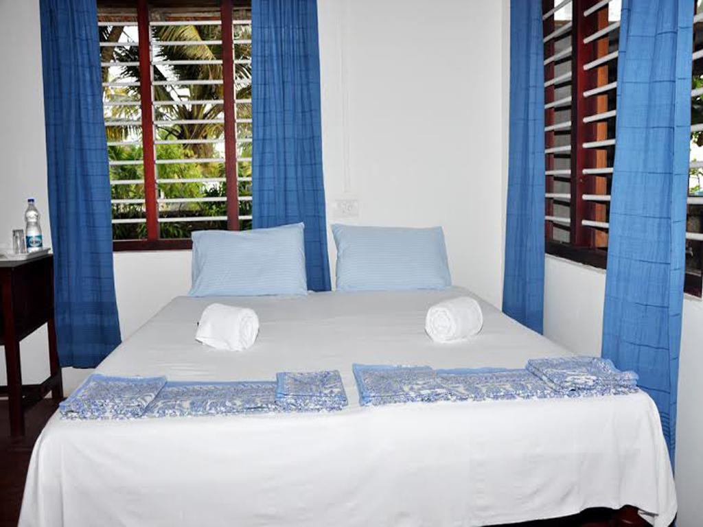 Angeo Beach House Alappuzha Rum bild